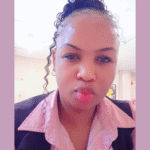 A smiling ZamaNguni Gumede wearing her Shoprite uniform in a selfie before her disappearance.