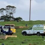 Emergency vehicles and police at Langefontein Cemetery during the exhumation of Thuleleni Shabalala’s body