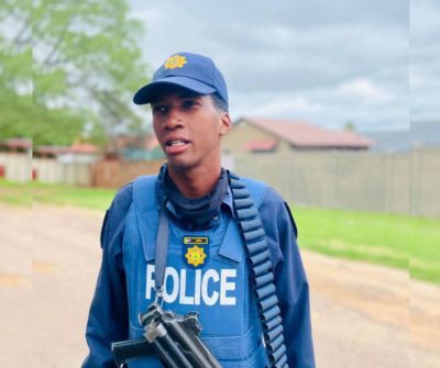 Constable Gift Mota in police uniform at Phokeng