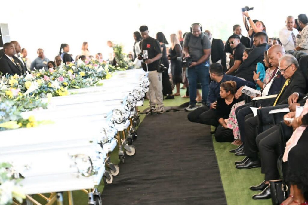 Funeral service for Monswamy family victims KwaZulu-Natal coffins lined up